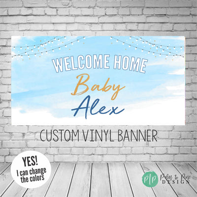 welcome home baby boy banner with blue watercolor background and fairy light details