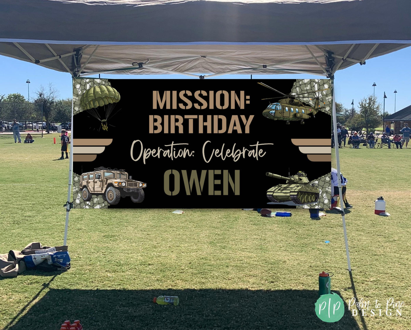 Military Mission birthday banner at outdoor park party