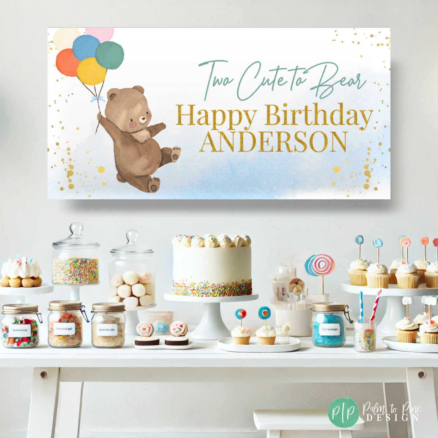 2nd Birthday Two Cute to Bear Teddy Bear Birthday Decorations in front of pastel rainbow dessert table
