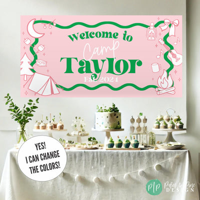Preppy girls glamping birthday banner displayed above a dessert table with pink, purple, and teal party décor, featuring a tent, lantern, campfire, and marshmallow accents. Personalized with birthday girl’s name and age behind green dessert table