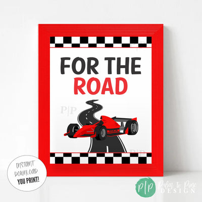 Racecar favor table sign with For the Road text, Formula One race car, road design, and checkered border