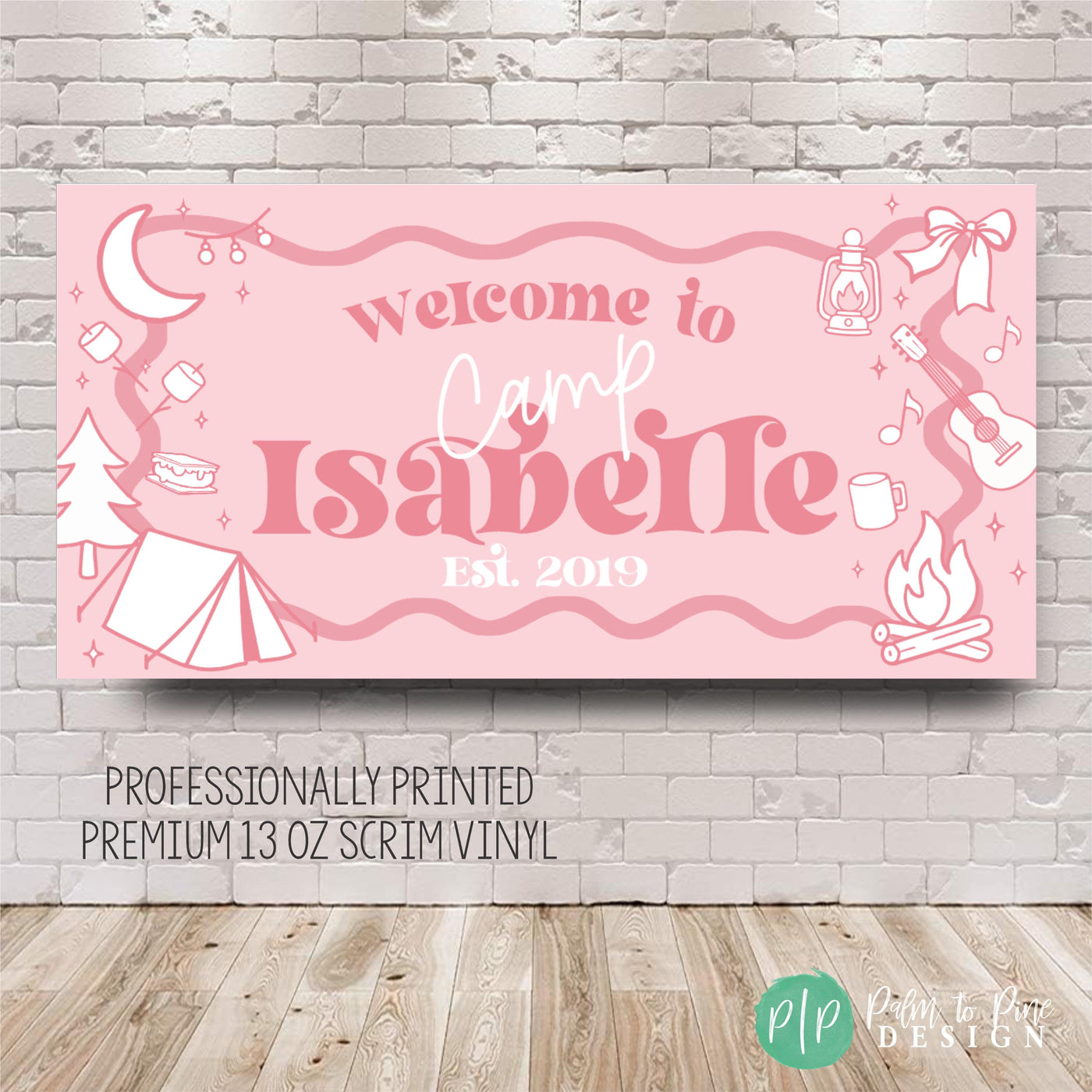 Custom glamping birthday party banner in preppy pink and girly camping theme, styled on a dessert table with cupcakes, cookies, and camp-inspired decorations